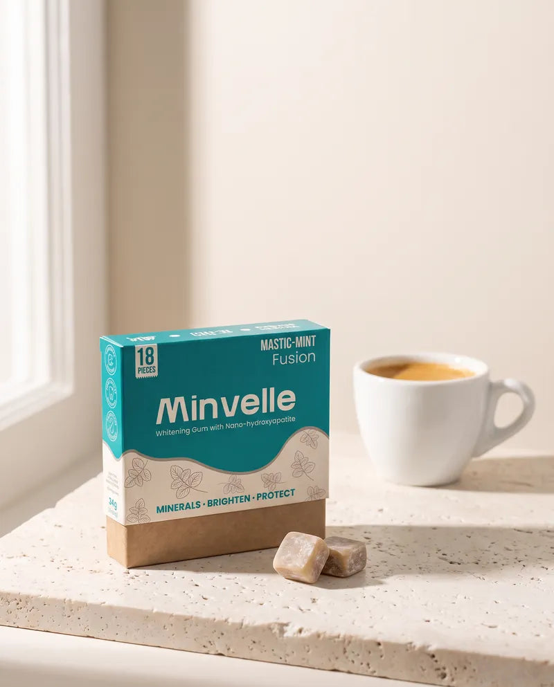 A Minvelle box next to a cup of coffee on a sunny counter